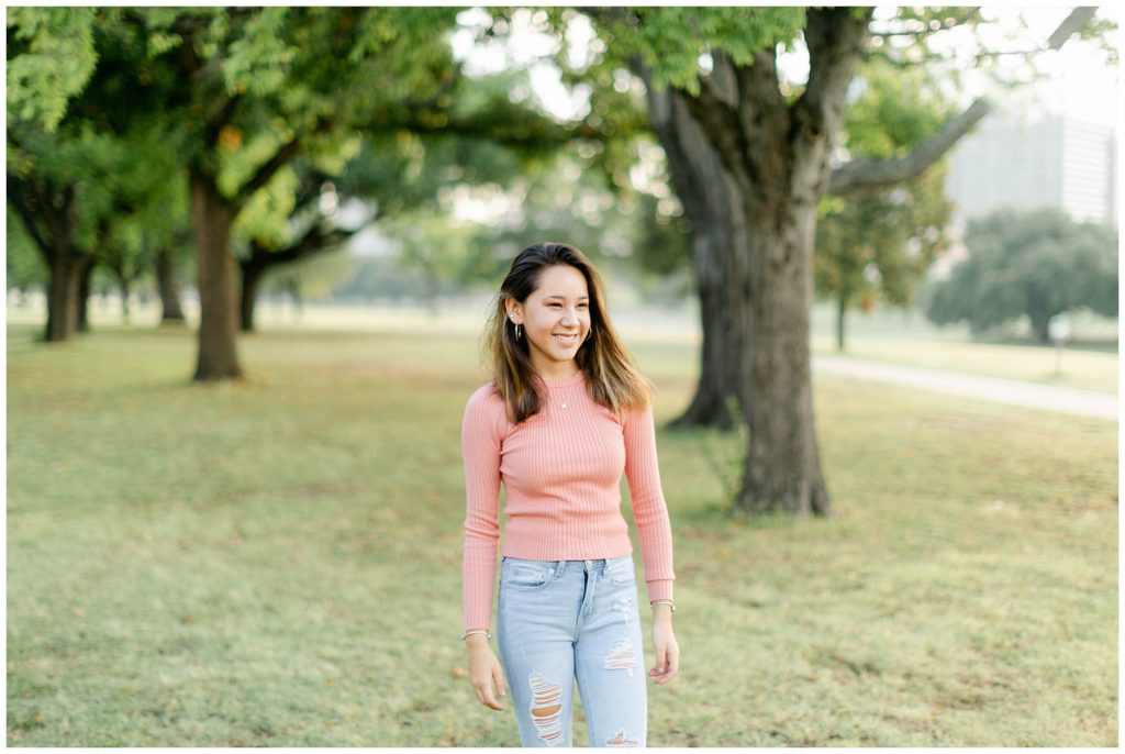 Girl walking through park