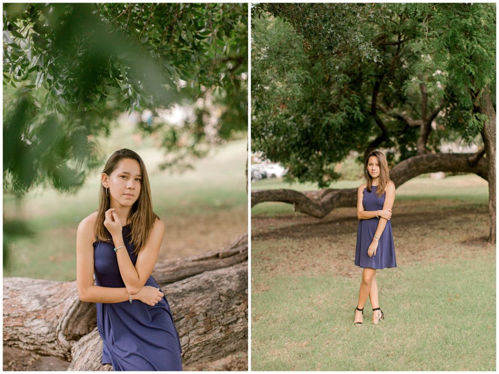 Girl in dress under large tree