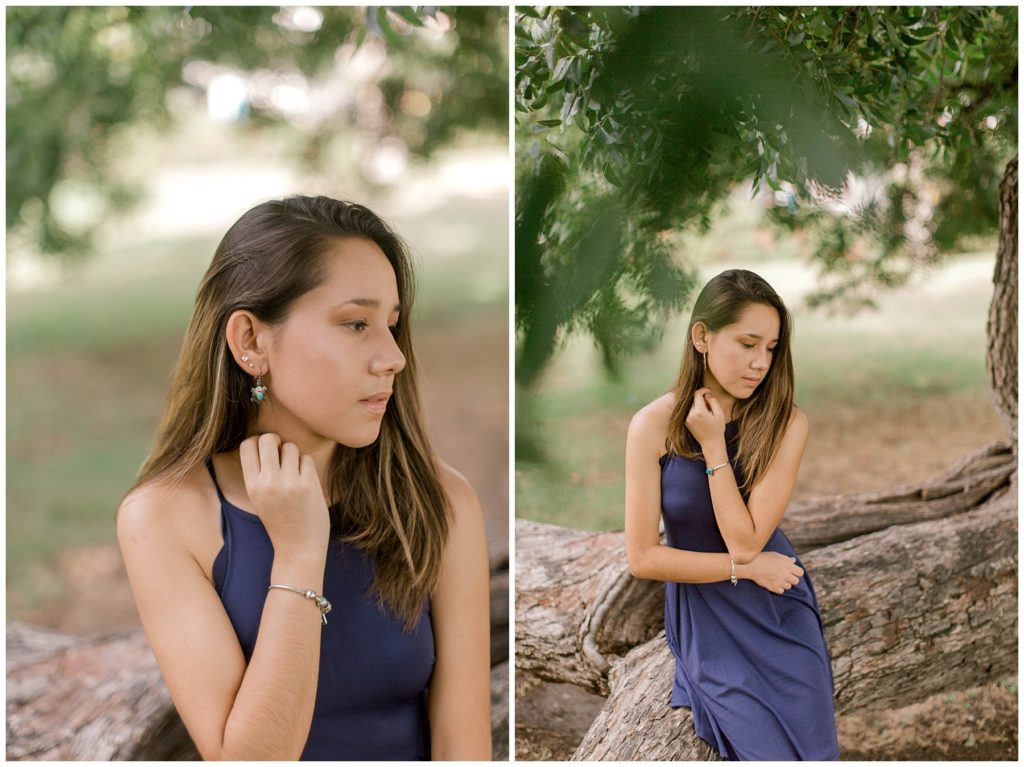 Girl in dress under large tree