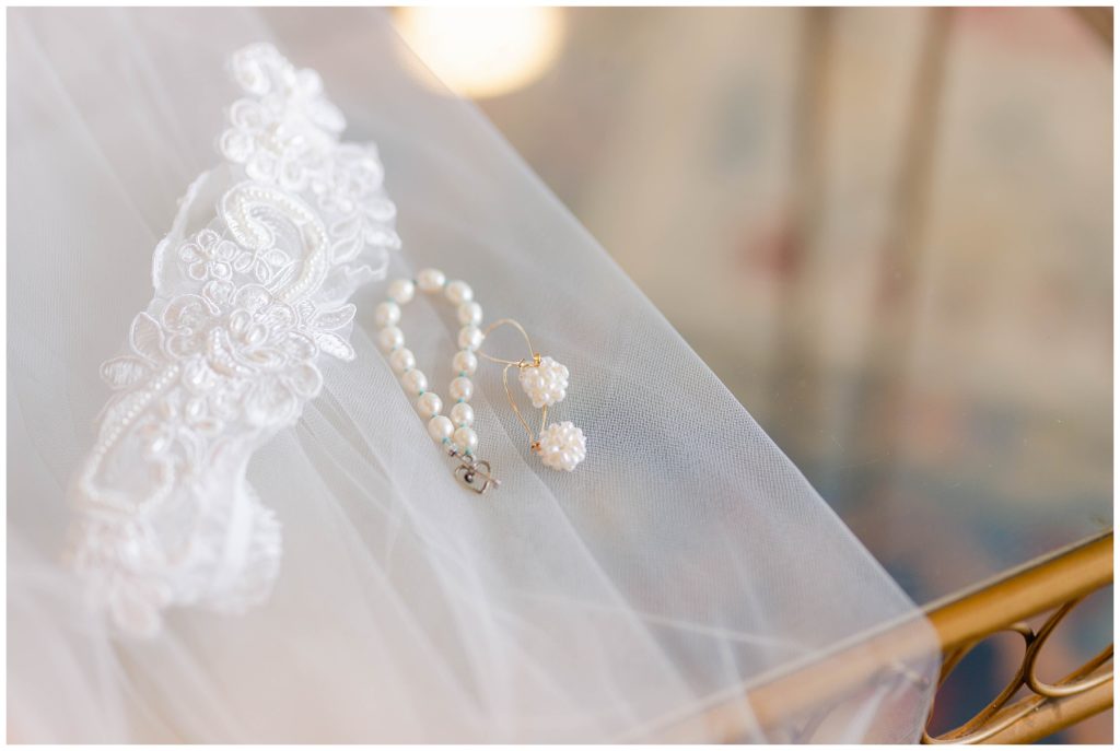 Wedding veil, garter and pearl jewelry