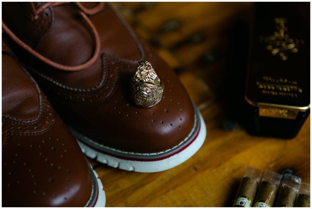 Groom rings, shoes and cigars