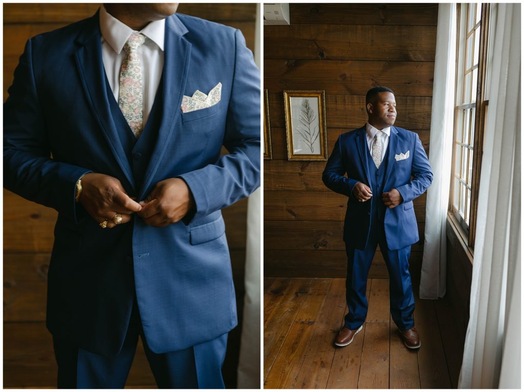 Groom standing getting ready by window