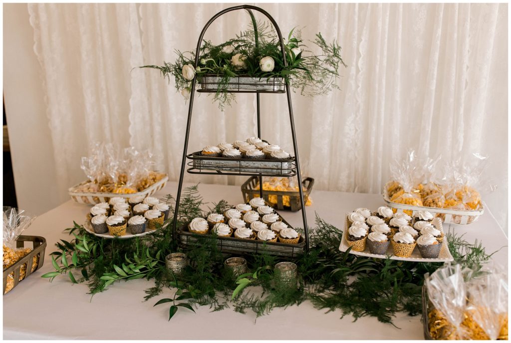 Wedding cupcakes on rustic tiered stand in Hugos on the square wedding