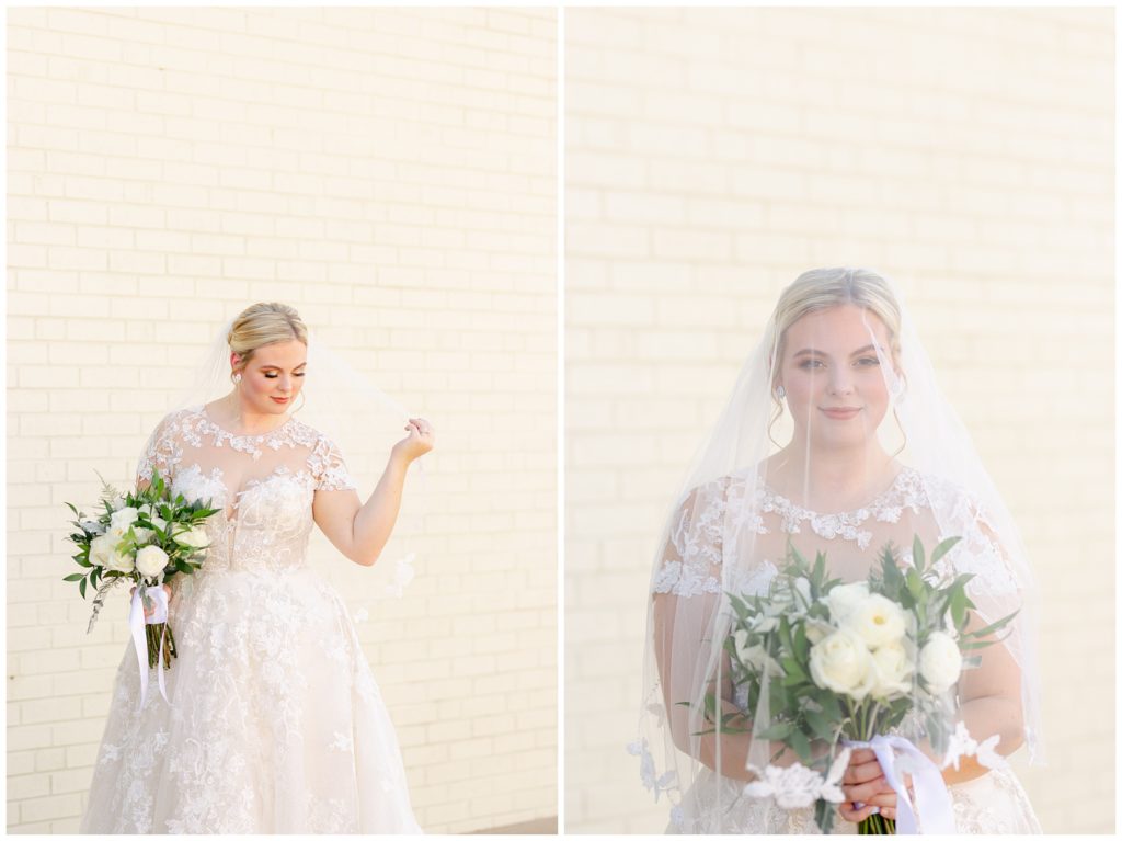 Bride standing in front of white brick wall