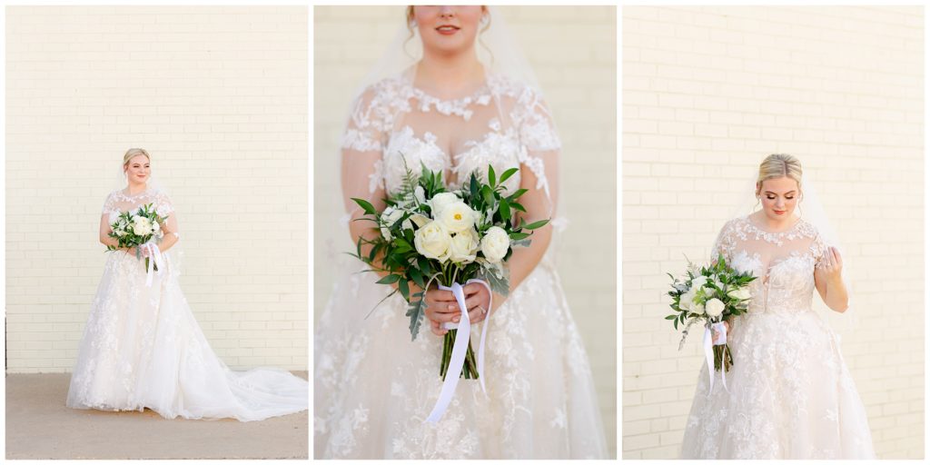 Bride standing in front of white brick wall