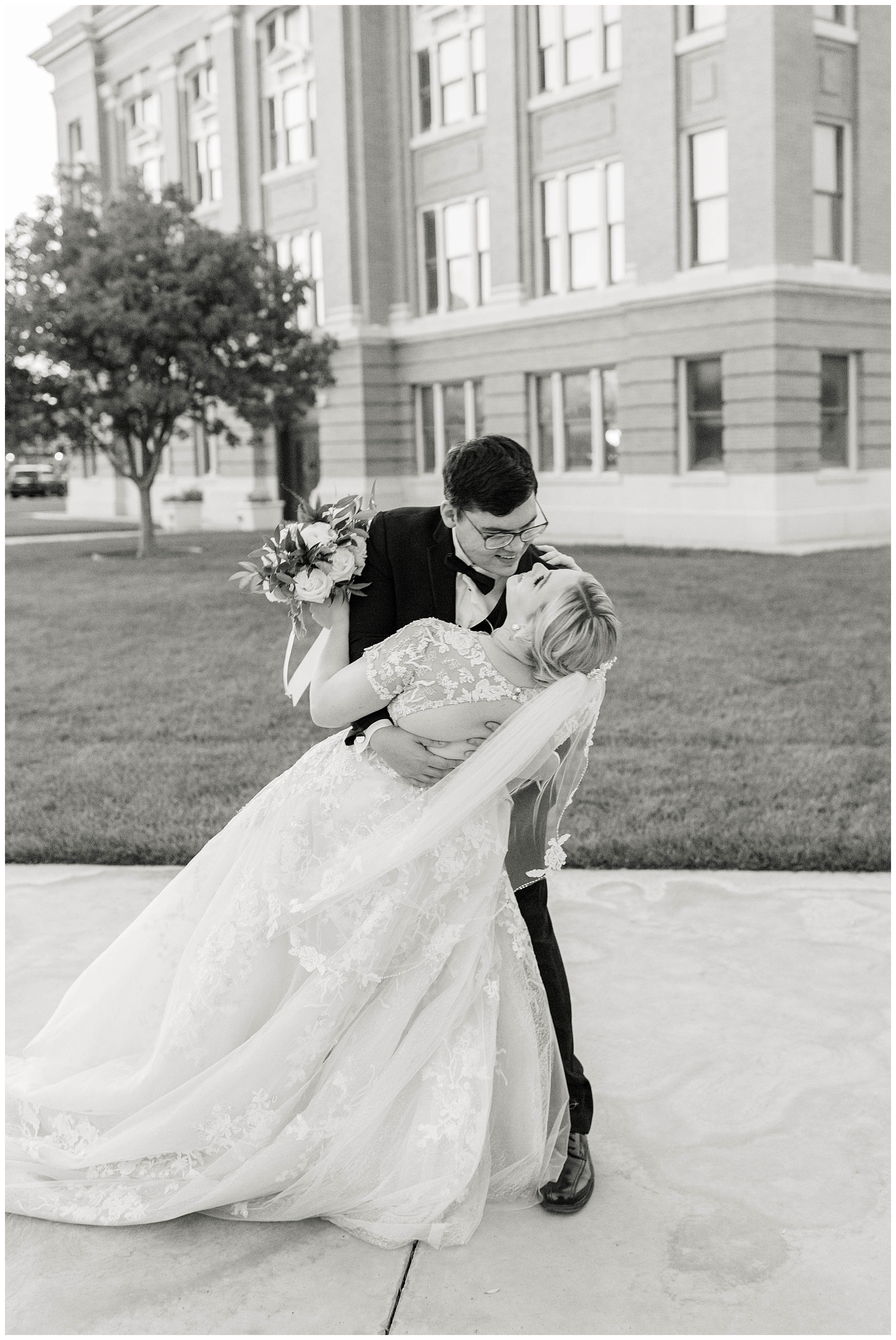 BW groom dipping bride