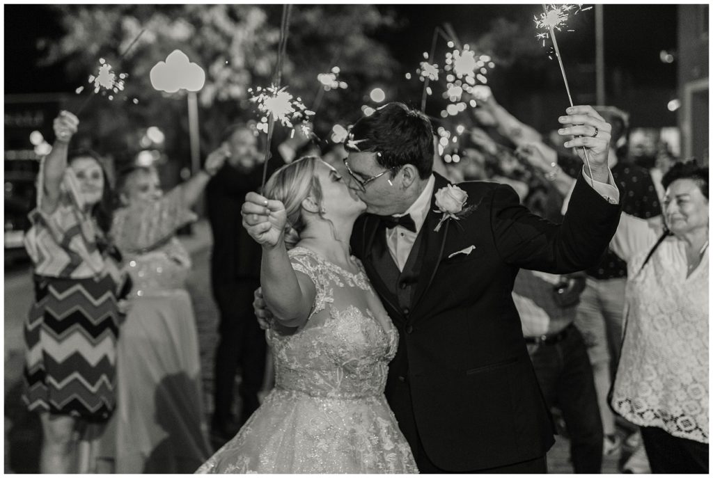 Bride and groom sparkler exit