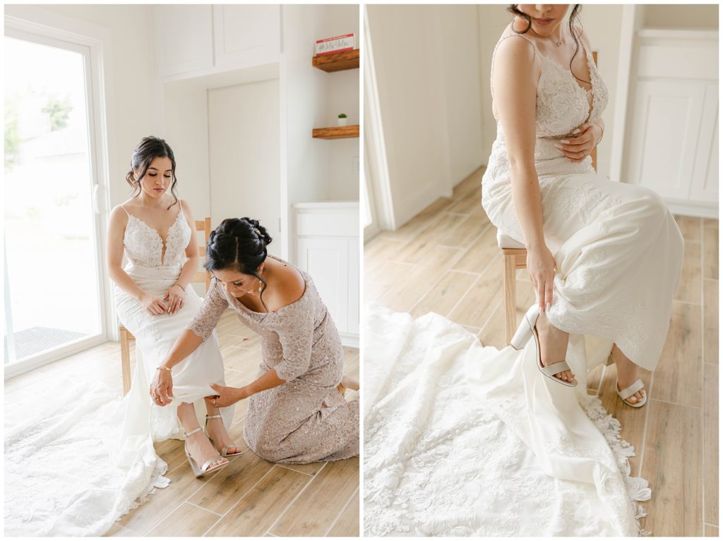 Mother of the bride helping bride into heels in Big White Barn wedding