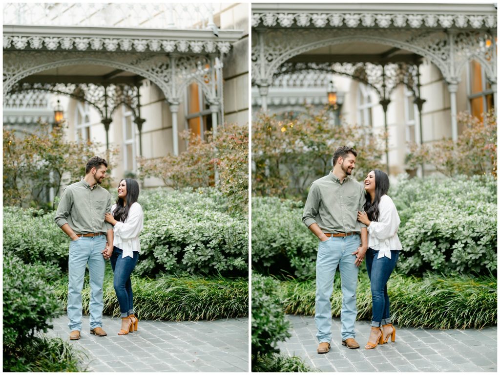 Couple walking through garden at Hotel Crescent Court engagement