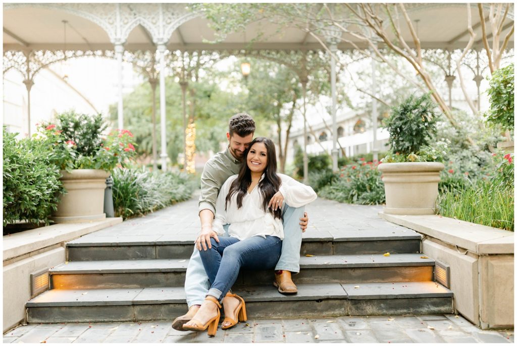 Couple cuddling on steps