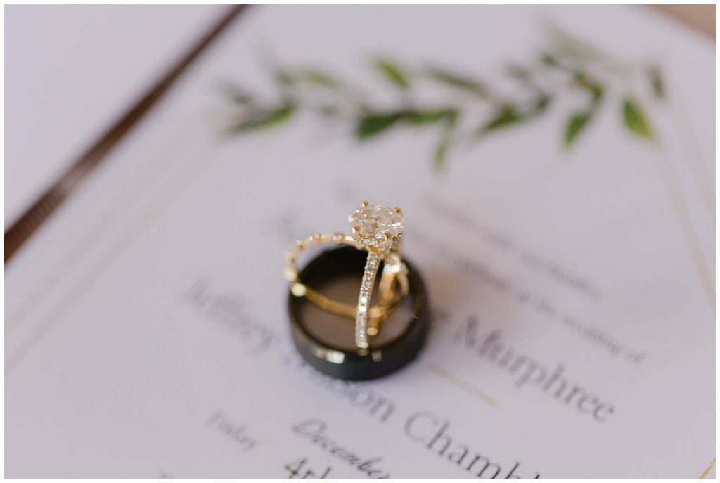 wedding ring propped inside another wedding ring