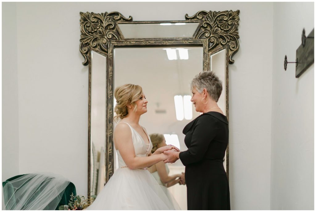 bride and mother of the bride getting ready