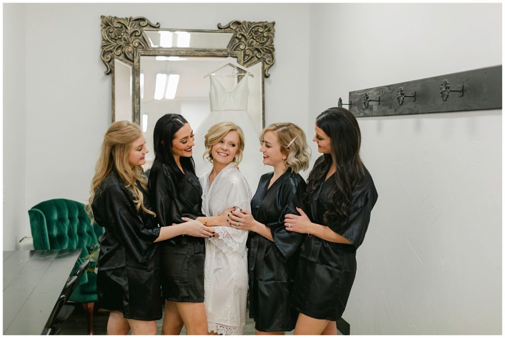 bride and bridesmaids getting ready for Hugo's on the Square wedding