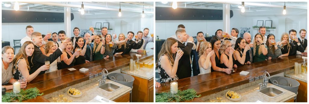 Wedding guests toasting and drinking together at Hugos