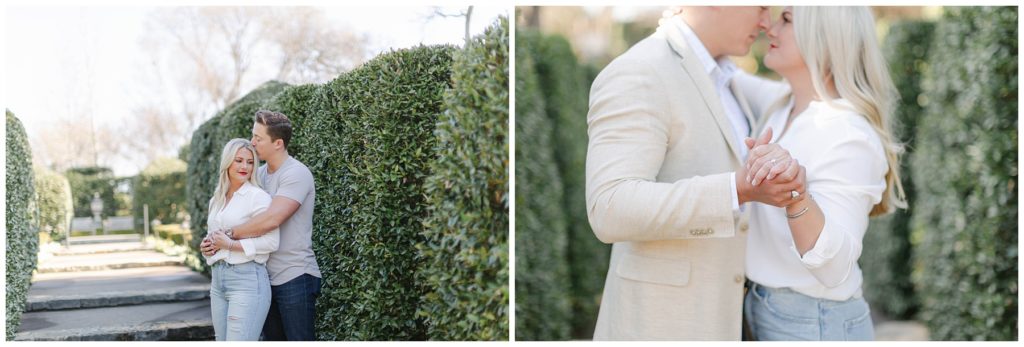 Guy hugging girl from behind and holding hands for Dallas arboretum engagment