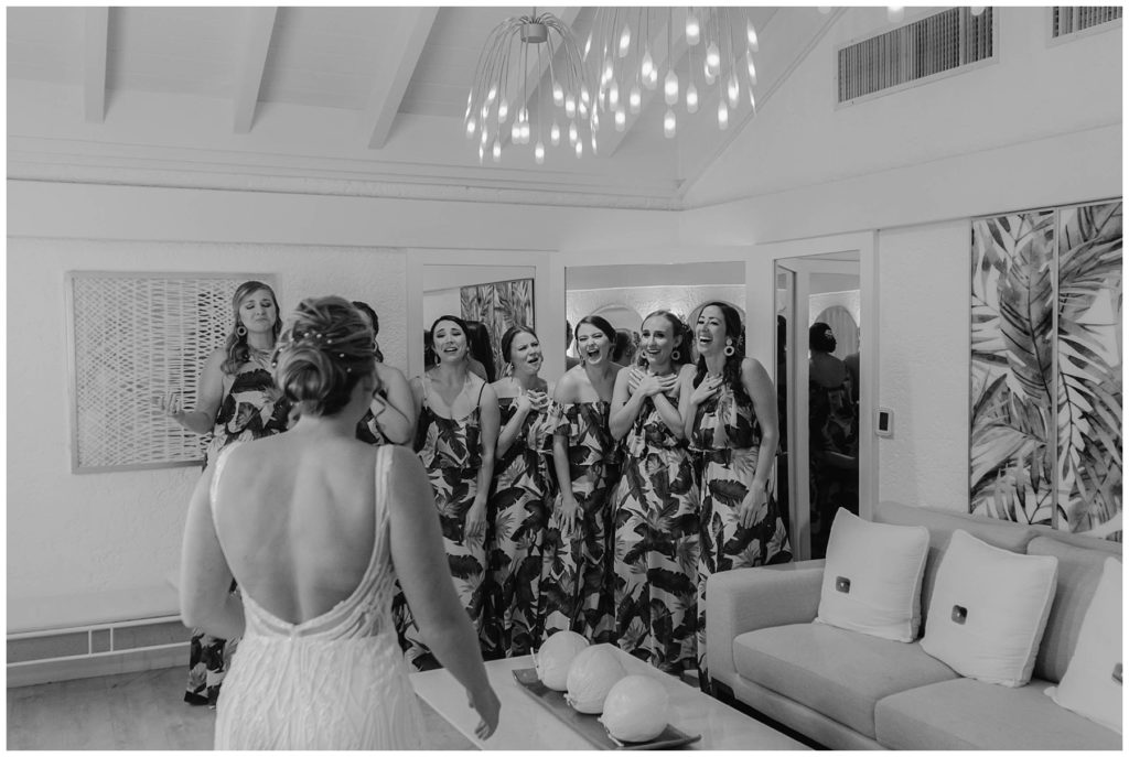 bridesmaids see bride in dress for first time