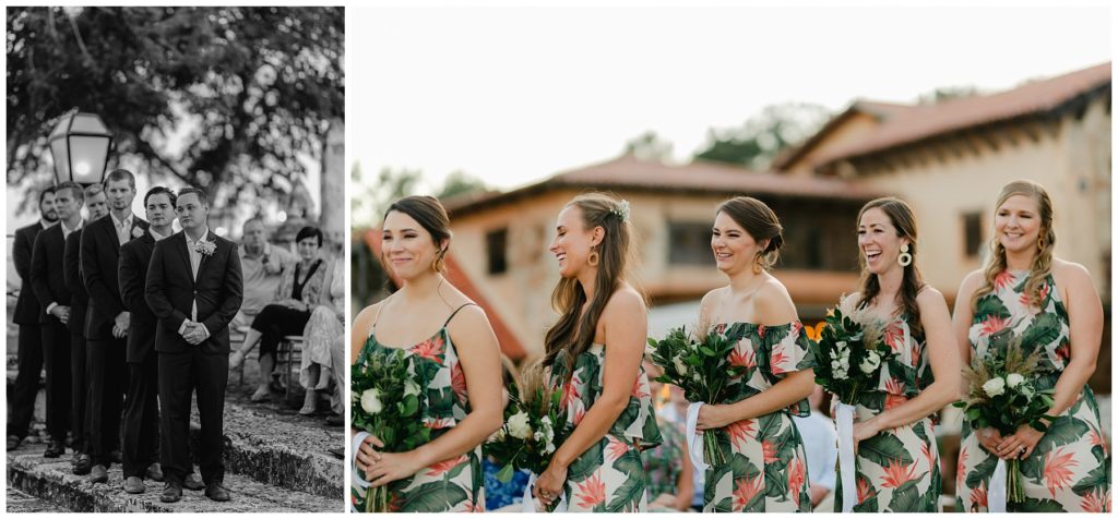 groomsmen and bridesmaid see bride walking down aisle