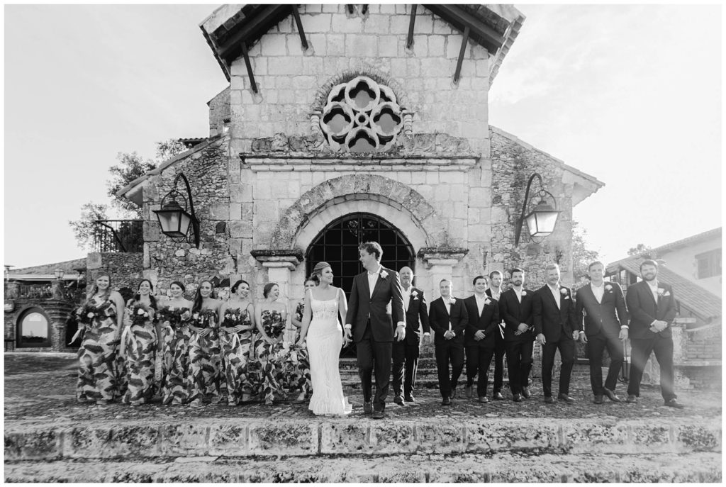Bridal party standing outside St. Stanislaus Church in Dominican Republic wedding