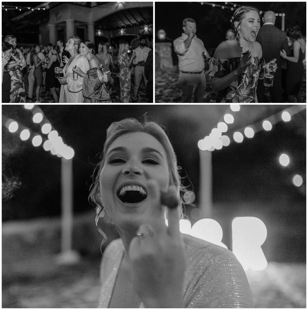 Bride drinking and smoking cigars with friends at wedding reception