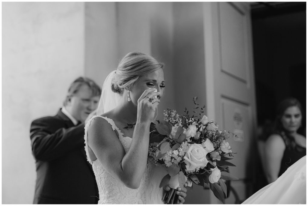 bride walking down aisle with father South Carolina Catholic Wedding