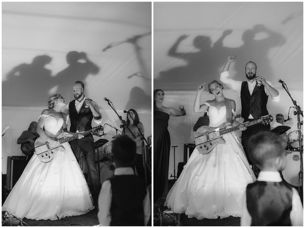 bride and groom rocking out on stage at wedding reception