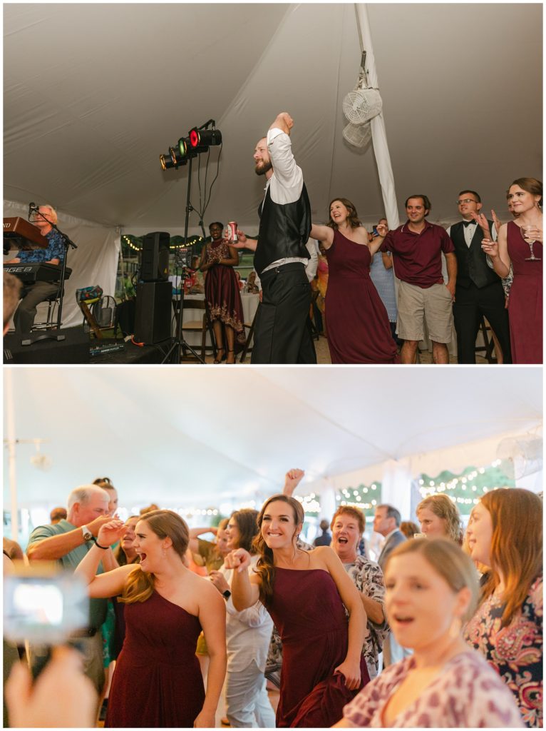 wedding guests cheering on dancefloor