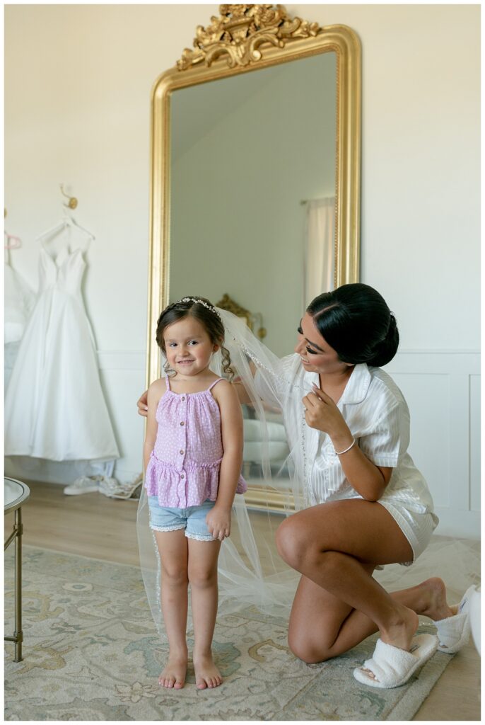 bride and flower girl at The Orchard Texas Wedding Venue