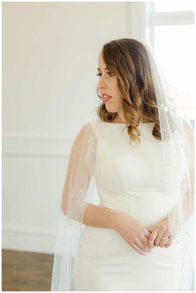 bride gazing into distance at The Springs in Weatherford Texas wedding