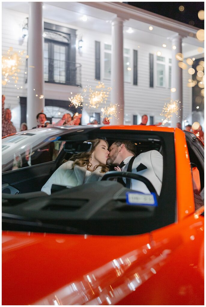 bride groom kissing in getaway car the springs at weatherford 